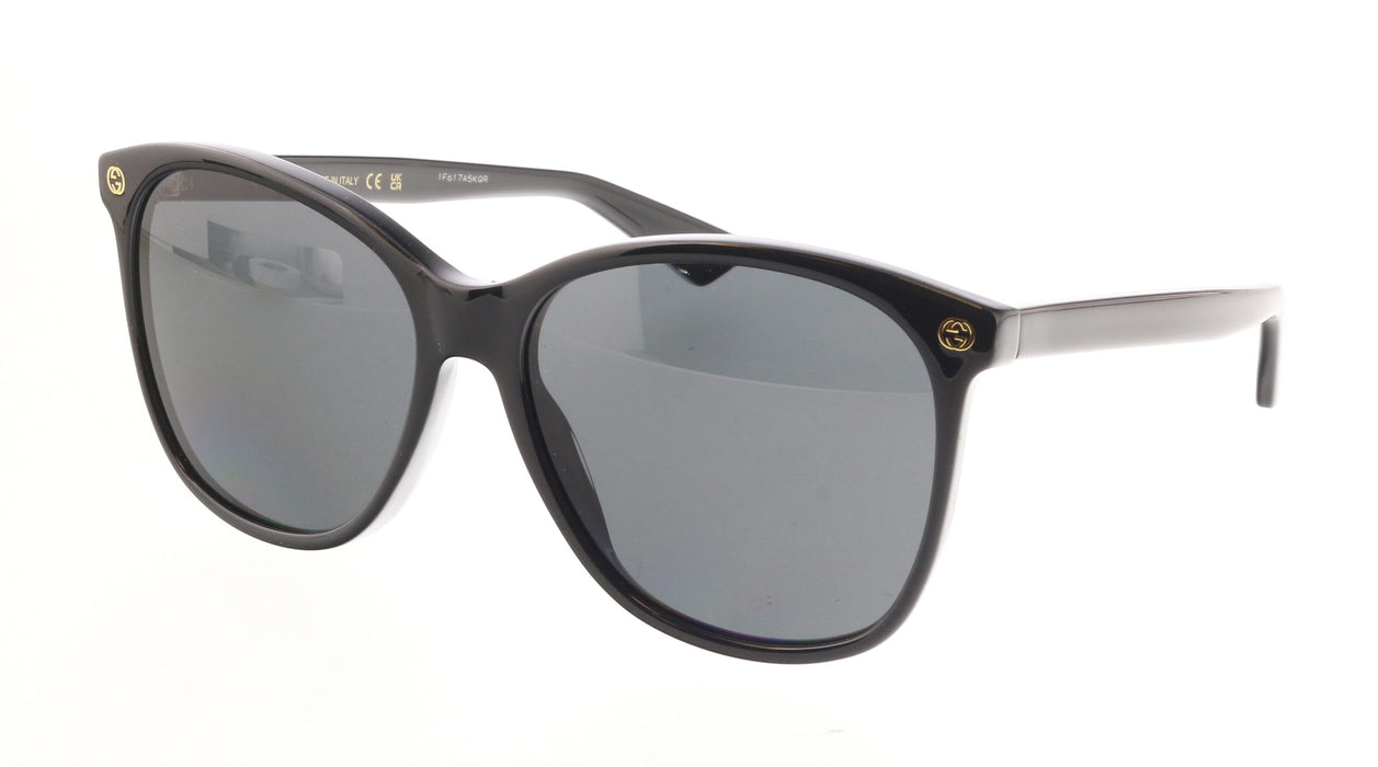 Gucci GG0024S-001 Chic Black Cat-Eye Shades with Gold Rivet Detail