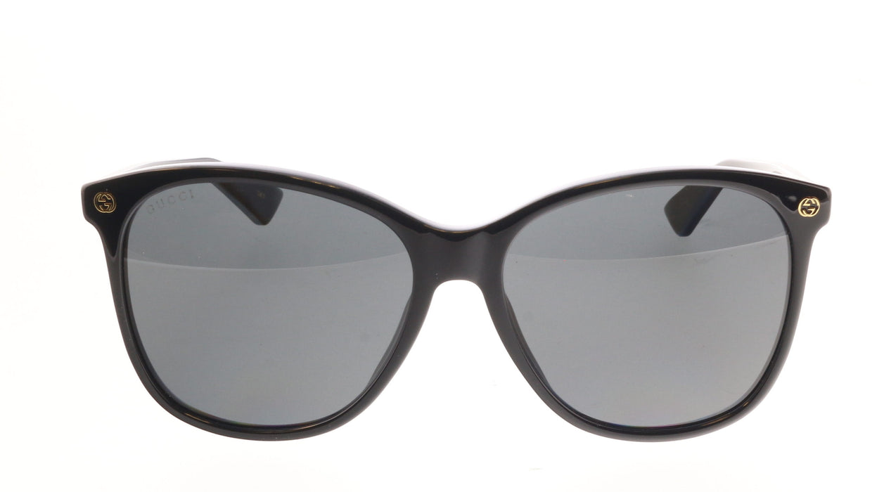 Gucci GG0024S-001 Chic Black Cat-Eye Shades with Gold Rivet Detail