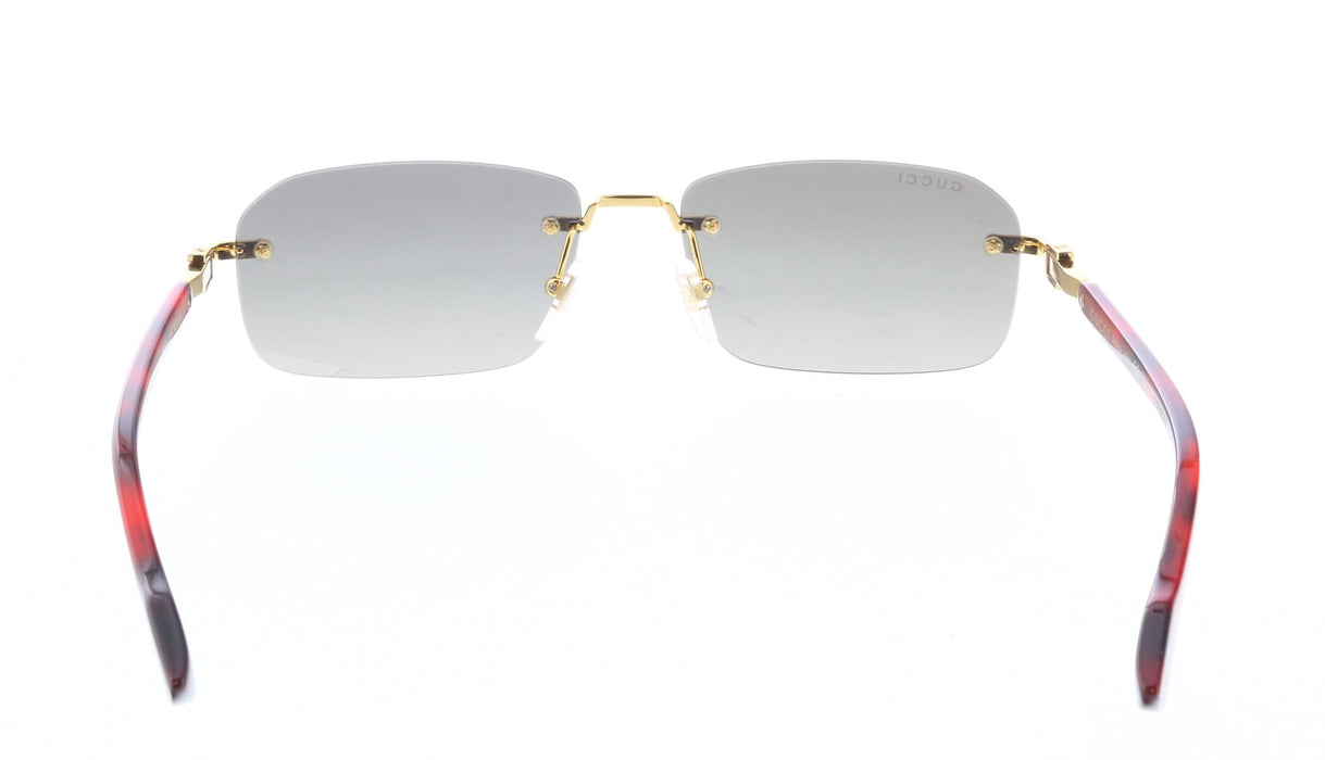 Gucci GG1221S-006 Luxury Rimless Sunglasses with Gold Detailing & Green Gradient