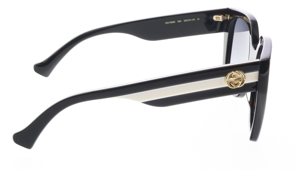 Gucci GG1300S-004 Bold Oversized Black Cat-Eye Sunglasses with Gold Emblem and W